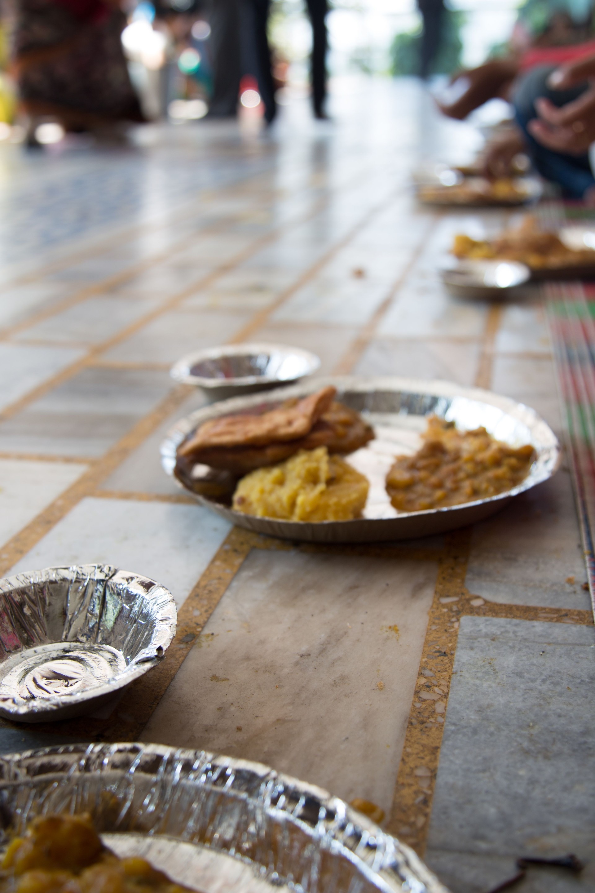 Poor people are fed at Hindu temple in India